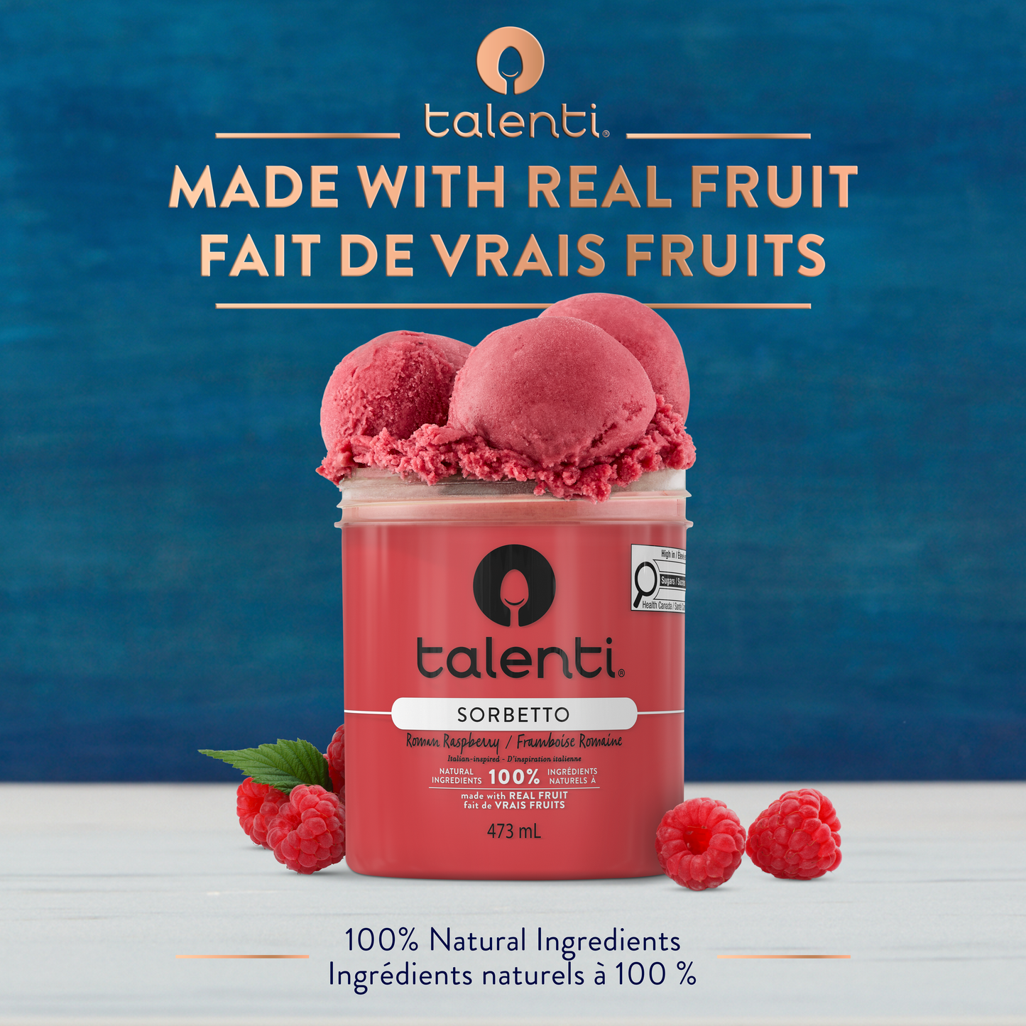 Bowl of Talenti Roman Raspberry Sorbetto with fresh raspberries and spoon
